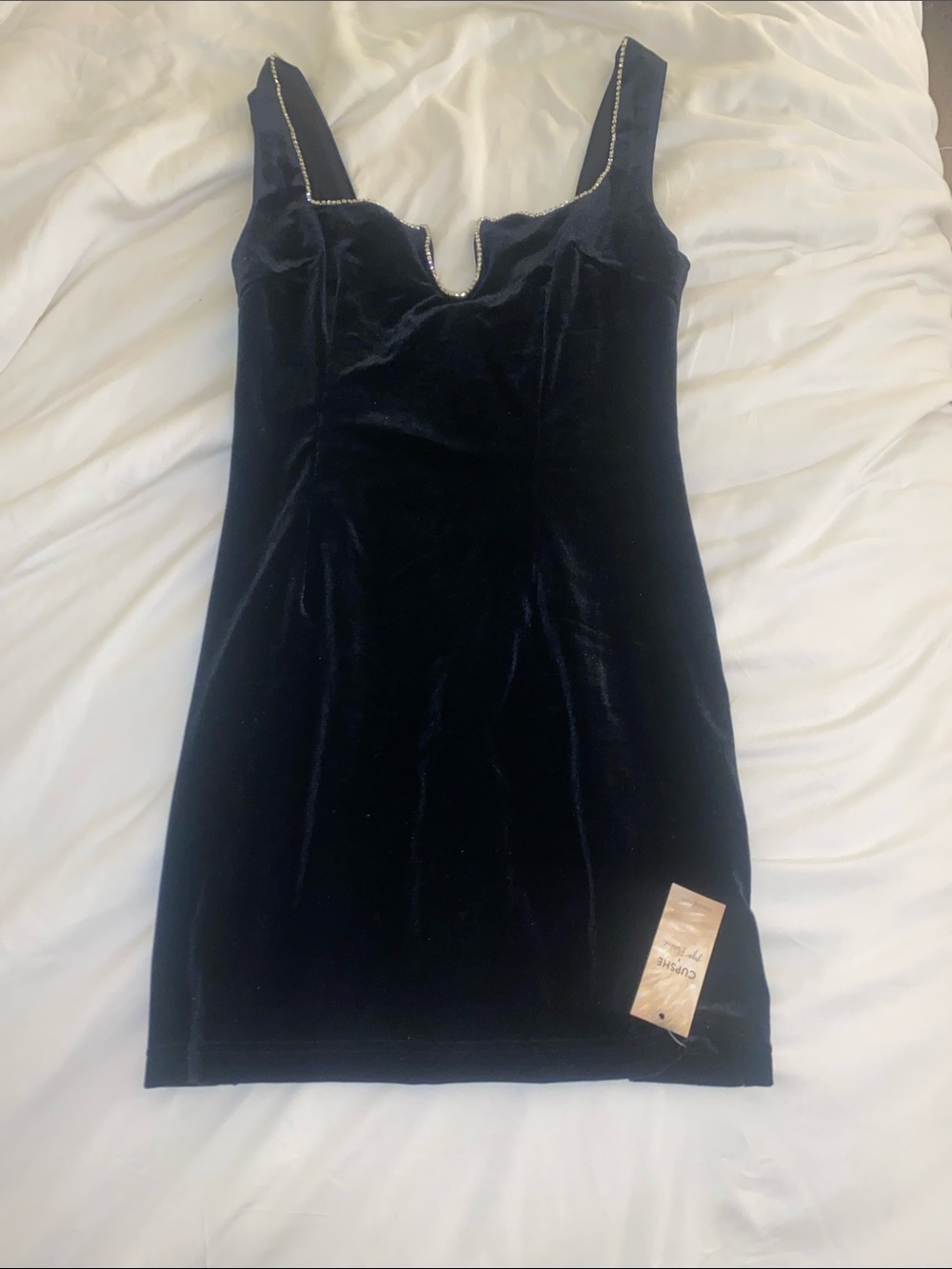 Classic Black Velvet Mini Dress with Rhinestone Trim and still has tags